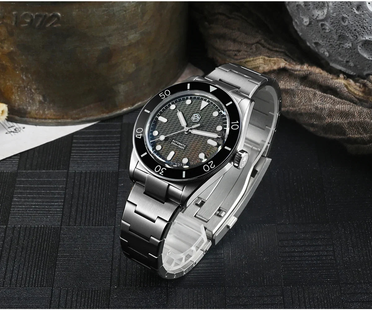 Brushed 316L steel case construction of San Martin Guilloche Pearl Diver with screw-down crown detail