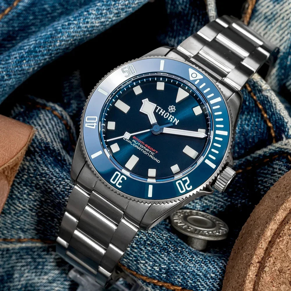 THORN Titanium Diver SHY036 automatic watch face-on displaying sunburst dial with luminous hands and numeralless markers under sapphire crystal