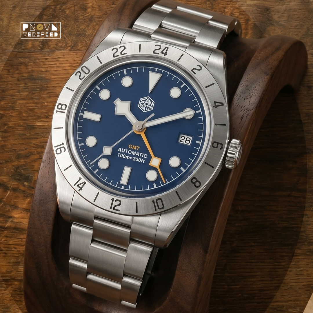 Close-up of San Martin Snowflake GMT dial showing applied indices, date window at 3 o'clock, and crisp matte black finish