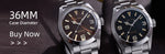Baltany Explorer amber dial explorer-style tribute watch at 6 o'clock position highlighting minimalist numberless design