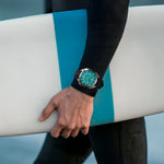 Full-frame wrist shot of the Berny AM1970M showing 44mm cushion case and extended fluoroelastomer band fit
