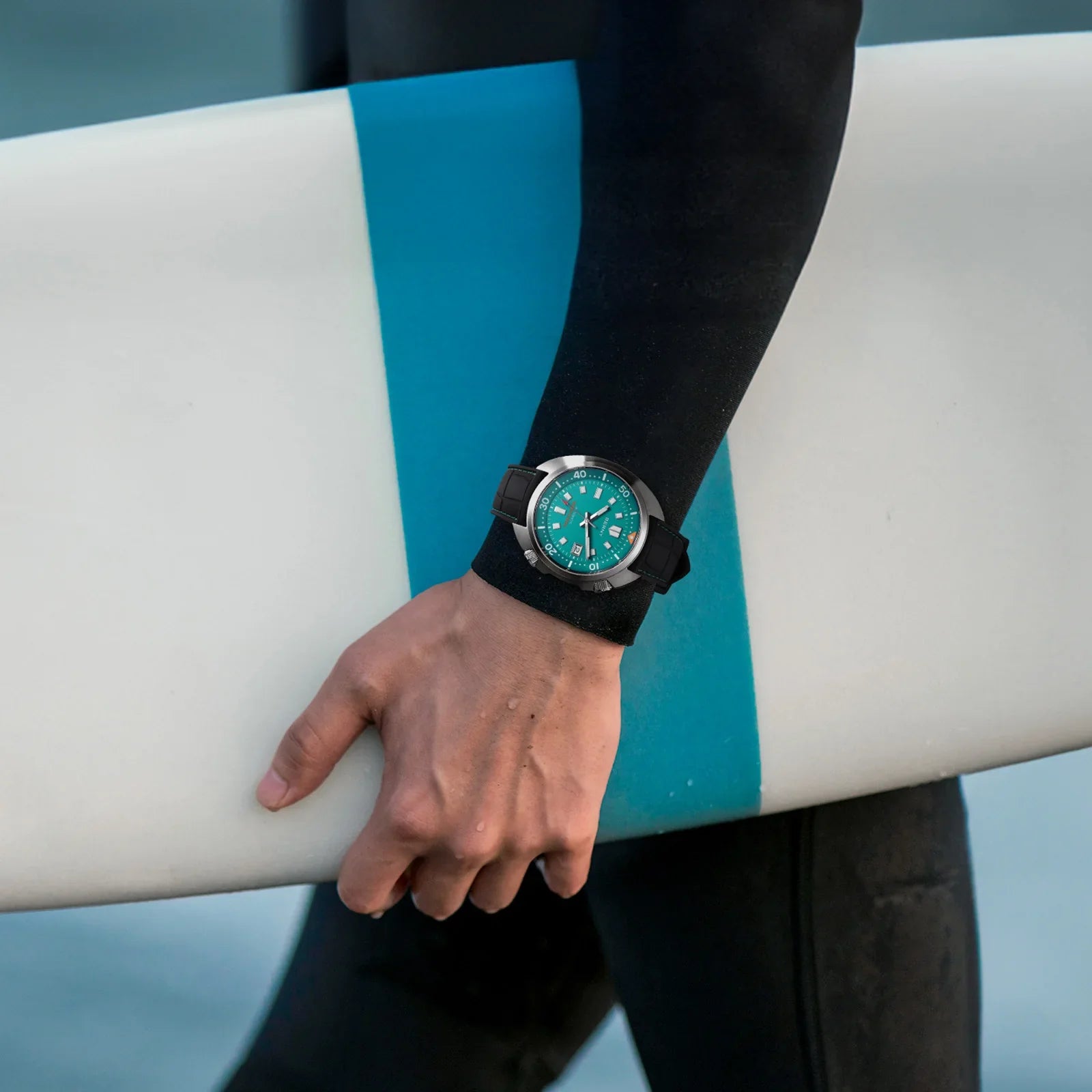 Full-frame wrist shot of the Berny AM1970M showing 44mm cushion case and extended fluoroelastomer band fit