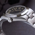 Full bracelet view Baltany Explorer mechanical watch with 20mm width stainless steel links and polished center connections