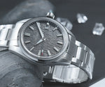 Cronos Arctic Ice L6037 mechanical watch with brushed stainless steel bracelet and textured dial under sapphire crystal