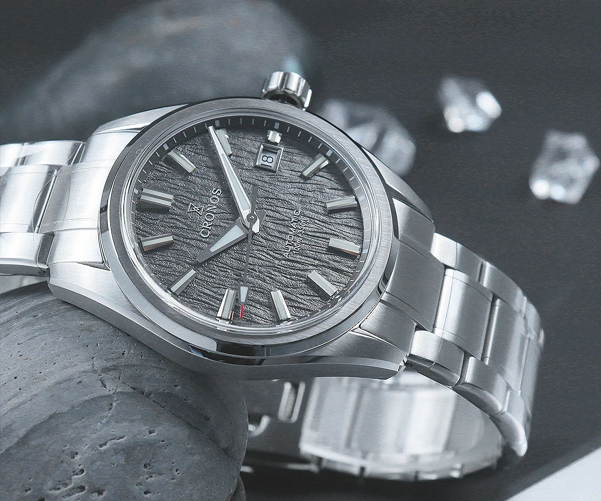 Cronos Arctic Ice L6037 mechanical watch with brushed stainless steel bracelet and textured dial under sapphire crystal