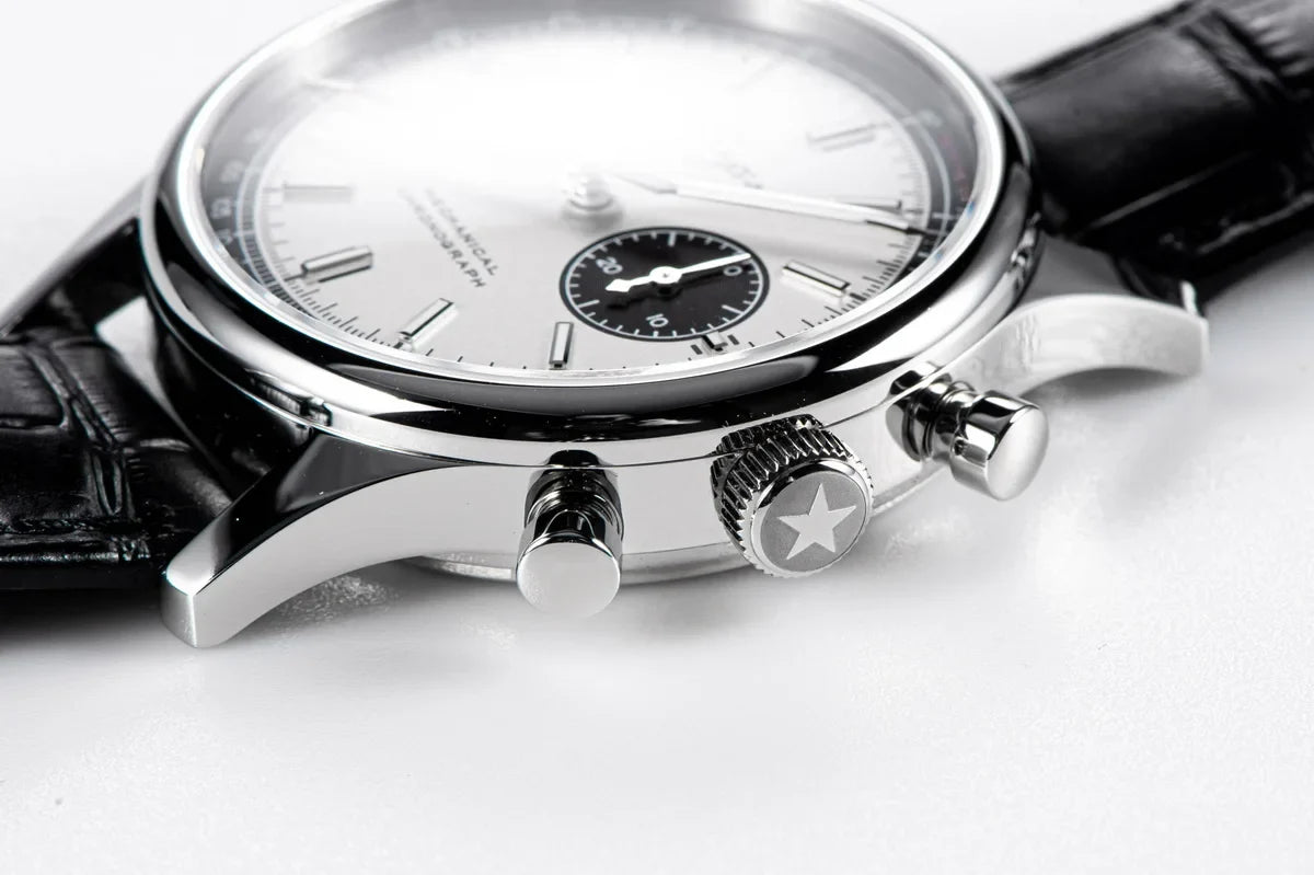Full lume shot of Sugess chronograph pilot watch with glowing dial, sapphire crystal protection, and three-hand functionality for aviation timing
