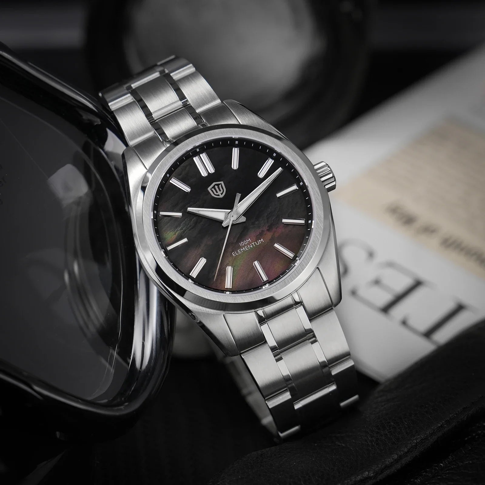 Watchdives WD0003C Elementum with aventurine dial catching light, sapphire crystal reflects Swiss-grade luxury in compact 38mm case