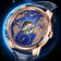 MERIDIAN Skeleton Automatic with open movement dial, luminous hands, and stainless steel case on cognac leather strap