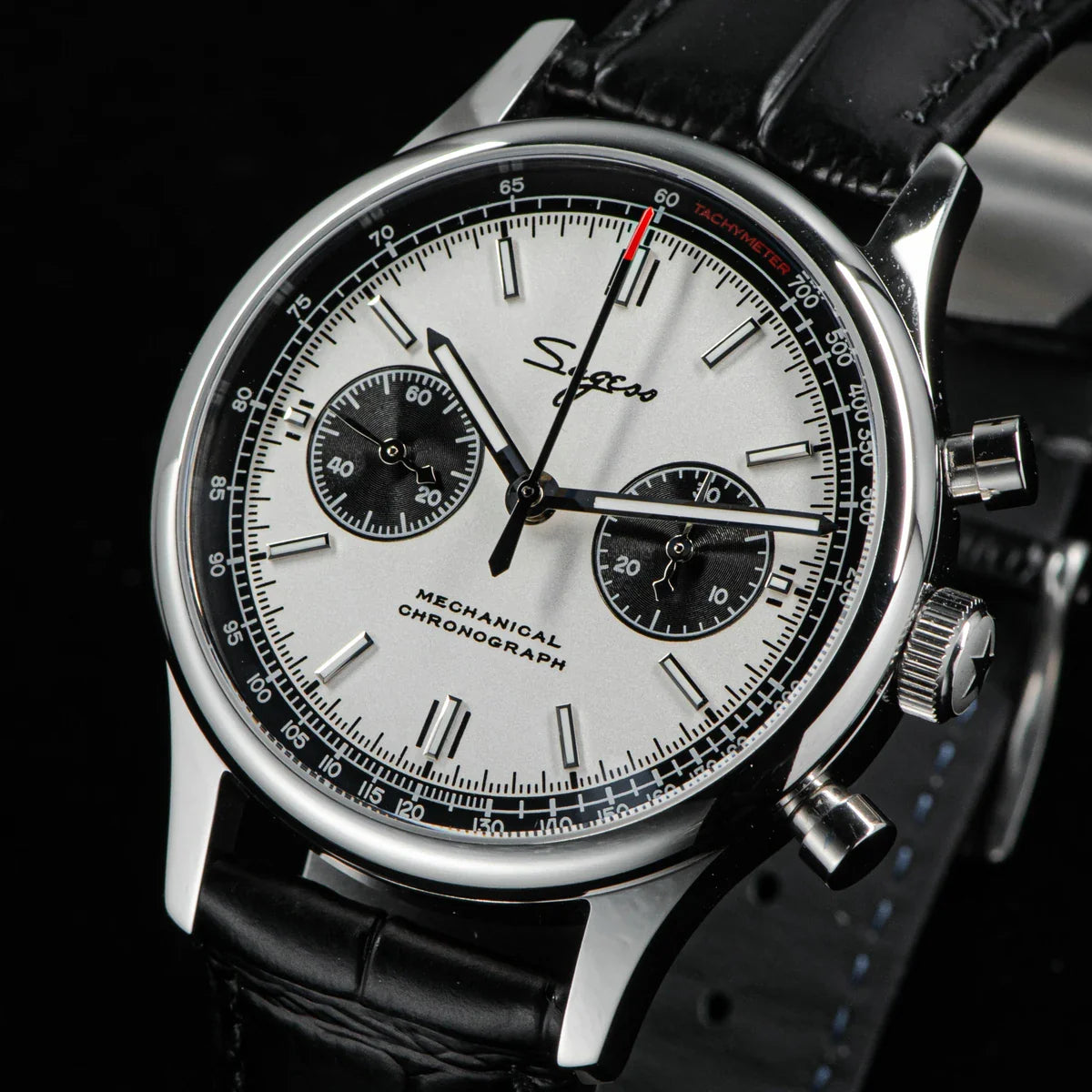 Three-quarter view revealing the 40mm round case profile and 50-meter water resistance capability of this Sugess mechanical watch