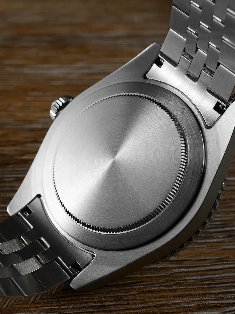 Purple dial variant of the SN0134-G GMT features classic 4-hand configuration with sapphire crystal and 316L steel case