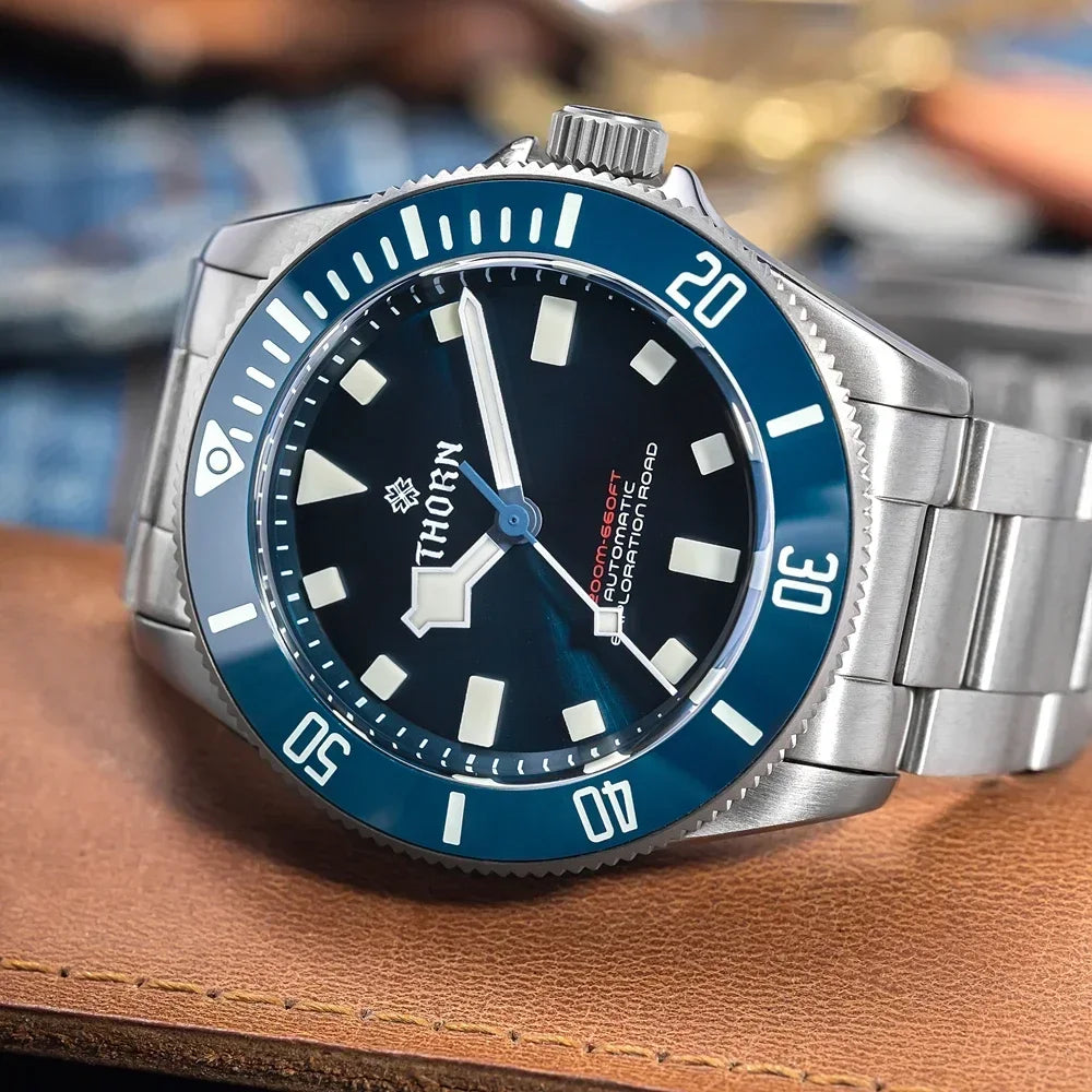 Screw-down crown and case side profile of THORN titanium diver emphasizing 12.1mm thickness and 200m water resistance capability