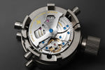 Full face Agelocer 6401A1 mechanical watch showing moon phase window and self-winding Cal.A4610 movement through exhibition