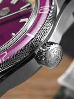 Close-up of San Martin automatic movement mechanism and brushed screw-down case back with 3D hexagon engraving detail