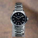 Full wrist shot of Proxima blue aventurine PX1746 displaying 100-meter water resistance capability and jewelry-grade stainless steel construction